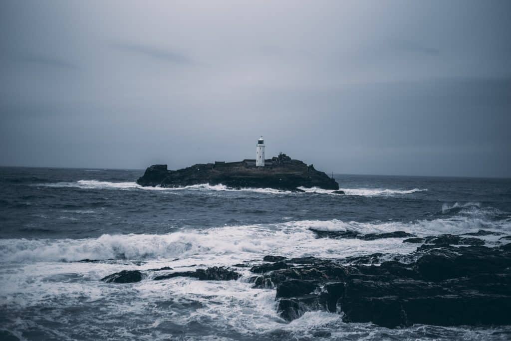 Picture of a storm and a lighthouse